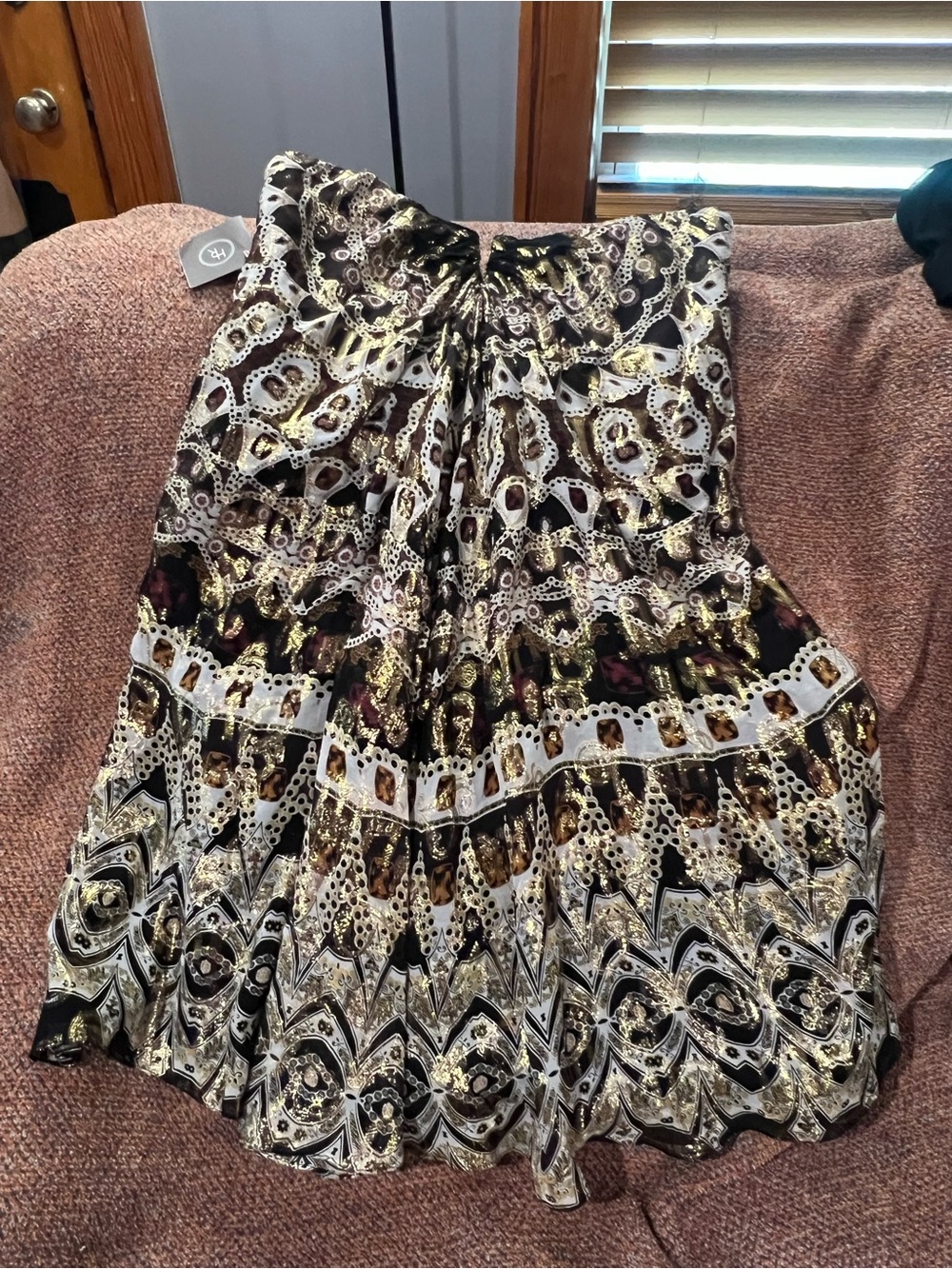 Nicole Miller Black strapless dress with Gold and black Pattern